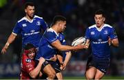 4 March 2017; Adam Byrne of Leinster offloads to Noel Reid despite the tackle of Ryan Elias of Scarlets during the Guinness PRO12 Round 17 match between Leinster and Scarlets at the RDS Arena in Ballsbridge, Dublin. Photo by Ramsey Cardy/Sportsfile