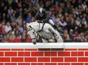 6 August 2011; Dave Quigley, Ireland, competing on Valetto Jx, gets his approach over the &quot;Wall&quot; wrong in the jump off during the Land Rover Puissance. Dublin Horse Show 2011. RDS, Ballsbridge, Dublin. Picture credit: Barry Cregg / SPORTSFILE