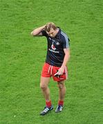 6 August 2011; A dejected Owen Mulligan, Tyrone, leaves the field after the game. GAA Football All-Ireland Senior Championship Quarter-Final, Dublin v Tyrone, Croke Park, Dublin. Picture credit: Daire Brennan / SPORTSFILE