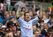 6 August 2011; A Dublin supporter cheers on his side during the closing stages of the GAA Football All-Ireland Senior Championship Quarter-Final, Dublin v Tyrone, Croke Park, Dublin. Picture credit: David Maher / SPORTSFILE