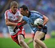 6 August 2011; Barry Cahill, Dublin, in action against Kevin Hughes, Tyrone. GAA Football All-Ireland Senior Championship Quarter-Final, Dublin v Tyrone, Croke Park, Dublin. Picture credit: David Maher / SPORTSFILE