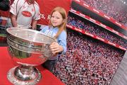 6 August 2011; Tyrone supporter Ava Kennan pictured with the Sam Maguire before the GAA Football All-Ireland Senior Championship Quarter-Final, Dublin v Tyrone, Croke Park, Dublin. Picture credit: David Maher / SPORTSFILE