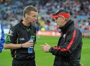 6 August 2011; Tyrone manager Mickey Harte in conversation with referee Joe McQuillan before the game. GAA Football All-Ireland Senior Championship Quarter-Final, Dublin v Tyrone, Croke Park, Dublin. Picture credit: Ray McManus / SPORTSFILE