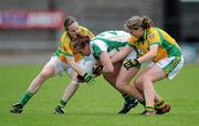 6 August 2011; Megan O'Connell, Kerry, in action against Karen Guthrie, 9, and Roisin Friel, 10, Donegal. TG4 Ladies Football All-Ireland Senior Championship Round 2 Qualifier, Donegal v Kerry, St Brendan's Park, Birr, Co. Offaly. Picture credit: Matt Browne / SPORTSFILE