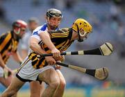 7 August 2011; Colin Fennelly, Kilkenny, is held by Waterford corner back Darragh Fives. GAA Hurling All-Ireland Senior Championship Semi-Final, Kilkenny v Waterford, Croke Park, Dublin. Picture credit: Ray McManus / SPORTSFILE