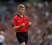 7 August 2011; Referee Barry Kelly indicates 'holding' as he cautions Waterford's Darragh Fives. GAA Hurling All-Ireland Senior Championship Semi-Final, Kilkenny v Waterford, Croke Park, Dublin. Picture credit: Ray McManus / SPORTSFILE