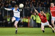4 March 2017; Ryan Mc Anespie of Monaghan scoring a point despite the attempted block of Kieran McGeary of Tyrone during the Allianz Football League Division 1 Round 4 match between Tyrone and Monaghan at Healy Park in Omagh, Co Tyrone. Photo by Oliver McVeigh/Sportsfile