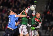 4 March 2017; Paddy Andrews and Niall Scully of Dublin compete for possession with Keith Higgins and Colm Boyle, right, of Mayo during the Allianz Football League Division 1 Round 4 match between Dublin and Mayo at Croke Park in Dublin. Photo by Brendan Moran/Sportsfile