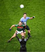 4 March 2017; Referee David Coldrick throws in the ball between Tom Parsons of Mayo and Michael Darragh Macauley of Dublin during the Allianz Football League Division 1 Round 4 match between Dublin and Mayo at Croke Park in Dublin. Photo by Ray McManus/Sportsfile