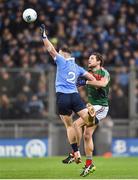 4 March 2017; Philip McMahon of Dublin intercepts a high ball ahead of Tom Parsons of Mayo during the Allianz Football League Division 1 Round 4 match between Dublin and Mayo at Croke Park in Dublin. Photo by David Fitzgerald/Sportsfile