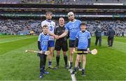 4 March 2017; Allianz mascots Cillian Keegan, left, and Jack Moore, both from Colmmille's GAA Club, Dublin, with team captains Kevin Moran of Waterford and Liam Rushe of Dublin and referee Johnny Ryan ahead of the Allianz Hurling League Division 1A Round 3 game between Dublin and Waterford at Croke Park in Dublin. Photo by Brendan Moran/Sportsfile