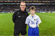 4 March 2017; Allianz mascot John Chew St Pius X NS, Templeogue, Dublin, with referee David Coldrick ahead of the Allianz Football League Division 1 Round 4 game between Dublin and Mayo at Croke Park in Dublin. Photo by Brendan Moran/Sportsfile
