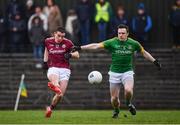 5 March 2017; Eamonn Brannigan of Galway has a shot on goal despite the tackle of Willie Carry of Meath during the Allianz Football League Division 2 Round 4 match between Meath and Galway at Páirc Tailteann in Navan, Co Meath. Photo by Ramsey Cardy/Sportsfile