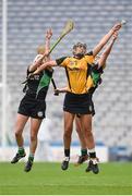 5 March 2017; Tara Wilson of Myshall in action against Shauna Jordan, left, and Niamh McNulty of Eglish during the AIB All-Ireland Intermediate Camogie Club Championship Final game between Myshall and Eglish at Croke Park in Dublin. Photo by Seb Daly/Sportsfile