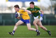 5 March 2017; Conor Devaney of Roscommon in action against Kevin McCarthy of Kerry during the Allianz Football League Division 1 Round 4 match between Roscommon and Kerry at Dr Hyde Park in Roscommon. Photo by Stephen McCarthy/Sportsfile