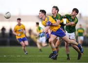 5 March 2017; John McManus of Roscommon in action against Donnchadh Walsh, left, and Jack Savage of Kerry during the Allianz Football League Division 1 Round 4 match between Roscommon and Kerry at Dr Hyde Park in Roscommon. Photo by Stephen McCarthy/Sportsfile