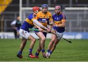 5 March 2017; David Fitzgerald of Clare in action against Willie Ryan and Steven O'Brien of Tipperary during the Allianz Hurling League Division 1A Round 3 match between Tipperary and Clare at Semple Stadium in Thurles, Co Tipperary. Photo by Matt Browne/Sportsfile
