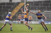 5 March 2017; John Conlon of Clare in action against Seamus Kennedy and Barry Haffernan of Tipperary during the Allianz Hurling League Division 1A Round 3 match between Tipperary and Clare at Semple Stadium in Thurles, Co Tipperary. Photo by Matt Browne/Sportsfile