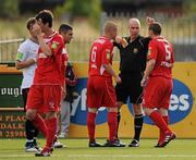 7 August 2011; Sligo Rovers players Danny Ventre, right, and Richie Ryan, remonstrate with Referee Tom Connolly after Ventre received a red card. Airtricity League Premier Division, Dundalk v Sligo Rovers, Oriel Park, Dundalk, Co. Louth. Picture credit: Oliver McVeigh / SPORTSFILE