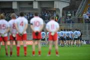 6 August 2011; The two teams of Dublin and Tyrone stand during the playing of the National Anthem. GAA Football All-Ireland Senior Championship Quarter-Final, Dublin v Tyrone, Croke Park, Dublin. Picture credit: David Maher / SPORTSFILE