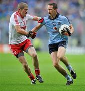 6 August 2011; Barry Cahill, Dublin, in action against Kevin Hughes, Tyrone. GAA Football All-Ireland Senior Championship Quarter-Final, Dublin v Tyrone, Croke Park, Dublin. Picture credit: David Maher / SPORTSFILE