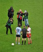 6 August 2011; Dublin captain Bryan Cullen, and Tyrone on-field captain Philip Jordan have their picture taken as they shake hands before the game. GAA Football All-Ireland Senior Championship Quarter-Final, Dublin v Tyrone, Croke Park, Dublin. Picture credit: Daire Brennan / SPORTSFILE