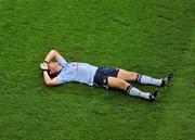 6 August 2011; Kevin Nolan, Dublin, lies on the pitch after suffering an injury which forced him to leave the game. GAA Football All-Ireland Senior Championship Quarter-Final, Dublin v Tyrone, Croke Park, Dublin. Picture credit: Daire Brennan / SPORTSFILE