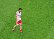 6 August 2011; A dejected Joe McMahon, Tyrone, leaves the pitch after the game. GAA Football All-Ireland Senior Championship Quarter-Final, Dublin v Tyrone, Croke Park, Dublin. Picture credit: Daire Brennan / SPORTSFILE