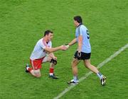6 August 2011; ƒamon Fennell, Dublin, shakes hands with Conor Gormley, Tyrone, after the game. GAA Football All-Ireland Senior Championship Quarter-Final, Dublin v Tyrone, Croke Park, Dublin. Picture credit: Daire Brennan / SPORTSFILE