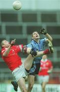 10 March 2002; Nicholas Murphy of Cork is tackled by Darren Magee of Dublin during the Allianz National Football League Division 1A Round 4 match between Cork and Dublin at Pairc Ui Chaoimh in Cork. Photo by Brendan Moran/Sportsfile