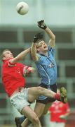 10 March 2002; Nicholas Murphy of Cork is tackled by Darren Magee of Dublin during the Allianz National Football League Division 1A Round 4 match between Cork and Dublin at Pairc Ui Chaoimh in Cork. Photo by Brendan Moran/Sportsfile