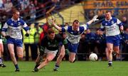 17 March 2002; John P O'Neill of Nemo Rangers in action against Ronan McGuckian of Ballinderry during the AIB All-Ireland Club Football Championship Final match between Ballinderry Shamrocks and Nemo Rangers at Semple Stadium inThurles, Tipperary. Photo by Brendan Moran/Sportsfile