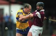 18 March 2002; Liam Hodgins of Galway in action against Ollie Baker of Clare during the Allianz National Hurling League Division 1A Round 3 match between Galway and Clare at Duggan Park in Ballinasloe, Galway. Photo by Ray McManus/Sportsfile
