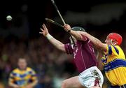18 March 2002; Eugene Cloonan of Galway wins possession ahead of Brian Lohan of Clare during the Allianz National Hurling League Division 1A Round 3 match between Galway and Clare at Duggan Park in Ballinasloe, Galway. Photo by Ray McManus/Sportsfile