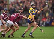 18 March 2002; Sean McMahon of Clare in action against Eugene Cloonan, 14, and Ollie Fahey of Galway during the Allianz National Hurling League Division 1A Round 3 match between Galway and Clare at Duggan Park in Ballinasloe, Galway. Photo by Ray McManus/Sportsfile