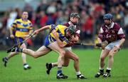 18 March 2002; Sean McMahon of Clare in action against Ollie Fahey of Clare during the Allianz National Hurling League Division 1A Round 3 match between Galway and Clare at Duggan Park in Ballinasloe, Galway. Photo by Ray McManus/Sportsfile