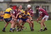 18 March 2002; Jamesie O'Connor of Clare supported by Conor Plunkett, 7, tries to gain possession from Galway players during the Allianz National Hurling League Division 1A Round 3 match between Galway and Clare at Duggan Park in Ballinasloe, Galway. Photo by Ray McManus/Sportsfile