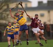 18 March 2002; Conor Plunkett of Clare holds possession under pressure from Richie Murray of Galway during the Allianz National Hurling League Division 1A Round 3 match between Galway and Clare at Duggan Park in Ballinasloe, Galway. Photo by Ray McManus/Sportsfile