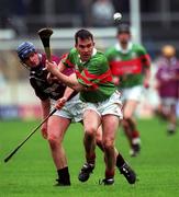 17 March 2002; Johnny Pilkington of Birr in action against David Forde of Clarinbridge during the AIB All-Ireland Club Hurling Championship Final match between Birr and Clarinbridge at Semple Stadium in Thurles, Tipperary. Photo by Ray McManus/Sportsfile