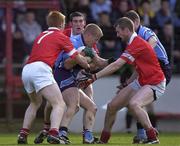 10 March 2002; Declan Darcy of Dublin in action against Sean Levis, 7, Noel O'Leary, and Nicholas Murphy, right, during the Allianz National Football League Division 1A Round 4 match between Cork and Dublin at Pairc Ui Chaoimh in Cork. Photo by Brendan Moran/Sportsfile