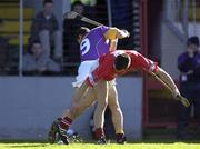 9 March 2002; Alan Cummins of Cork in action against Larry O'Gorman of Wexford during the Allianz National Hurling League Division 1B Round 2 match between Cork and Wexford at Pairc Ui Chaoimh in Cork. Photo by Brendan Moran/Sportsfile
