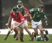 25 February 2002; Kieran Murphy of Cork in action against Stephen Lucey of Limerick during the Allianz National Hurling League Division 1B Round 1 match between Limerick and Cork at the Gaelic Grounds in Limerick. Photo by Brendan Moran/Sportsfile