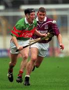 17 March 2002; Simon Whelahan of Birr is tackled by Brian Carr of Clarinbridge during the AIB All-Ireland Club Hurling Championship Final match between Birr and Clarinbridge at Semple Stadium in Thurles, Tipperary. Photo by Ray McManus/Sportsfile