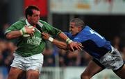22 March 2002; Keith Gleeson of Ireland is tackled by Juan Sebastien Francesio of Italy during an International Friendly between Ireland A and Italy A at Donnybrook Stadium, Dublin. Photo by Brendan Moran/Sportsfile