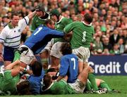23 March 2002; Peter Clohessy, 1, of Ireland is punched by Giampiero de Carli of Italy during the Six Nations Rugby Championship match between Ireland and Italy at Lansdowne Road in Dublin. Photo by Matt Browne/Sportsfile