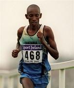 24 March 2002; John Yuda of Tanzania competing in the senior mens short course race during the 2002 IAAF Sport Ireland World Cross Country Championships at Leopardstown Racecourse in Dublin. Photo by Brendan Moran/Sportsfile