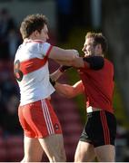 5 March 2017; James Kielt of Derry in dispute with Darren O'Hagan of Down during the Allianz Football League Division 2 Round 4 match between Derry and Down at Celtic Park, Derry, Co. Derry Photo by Oliver McVeigh/Sportsfile