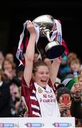 5 March 2017; Aoife Ní Chaiside of Slaughtneil lifts the Bill & Agnes Carroll Cup following her side's victory during the AIB All-Ireland Senior Camogie Club Championship Final game between Sarsfields and Slaughtneil at Croke Park in Dublin. Photo by Seb Daly/Sportsfile