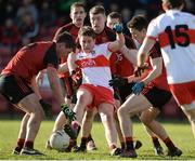 5 March 2017; Barry Grant of Derry crowded out by Peter Turley, Conor Maginn and Ryan McAleenan of Down   during the Allianz Football League Division 2 Round 4 match between Derry and Down at Celtic Park, Derry, Co. Derry Photo by Oliver McVeigh/Sportsfile