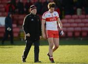 5 March 2017; A disappointed James Kielt of Derry along with Derry selector Tony Scullion walk off the pitch after the Allianz Football League Division 2 Round 4 match between Derry and Down at Celtic Park, Derry, Co. Derry Photo by Oliver McVeigh/Sportsfile